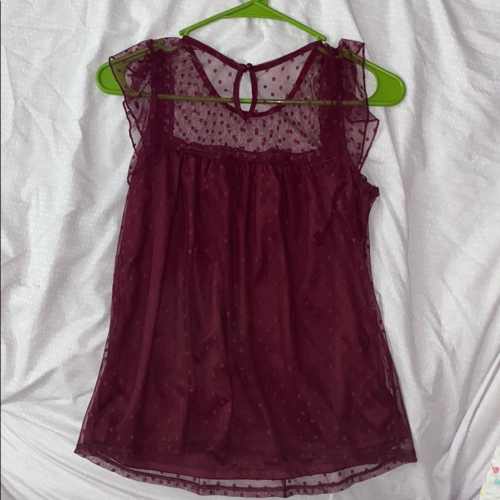 A Burgundy see-through top